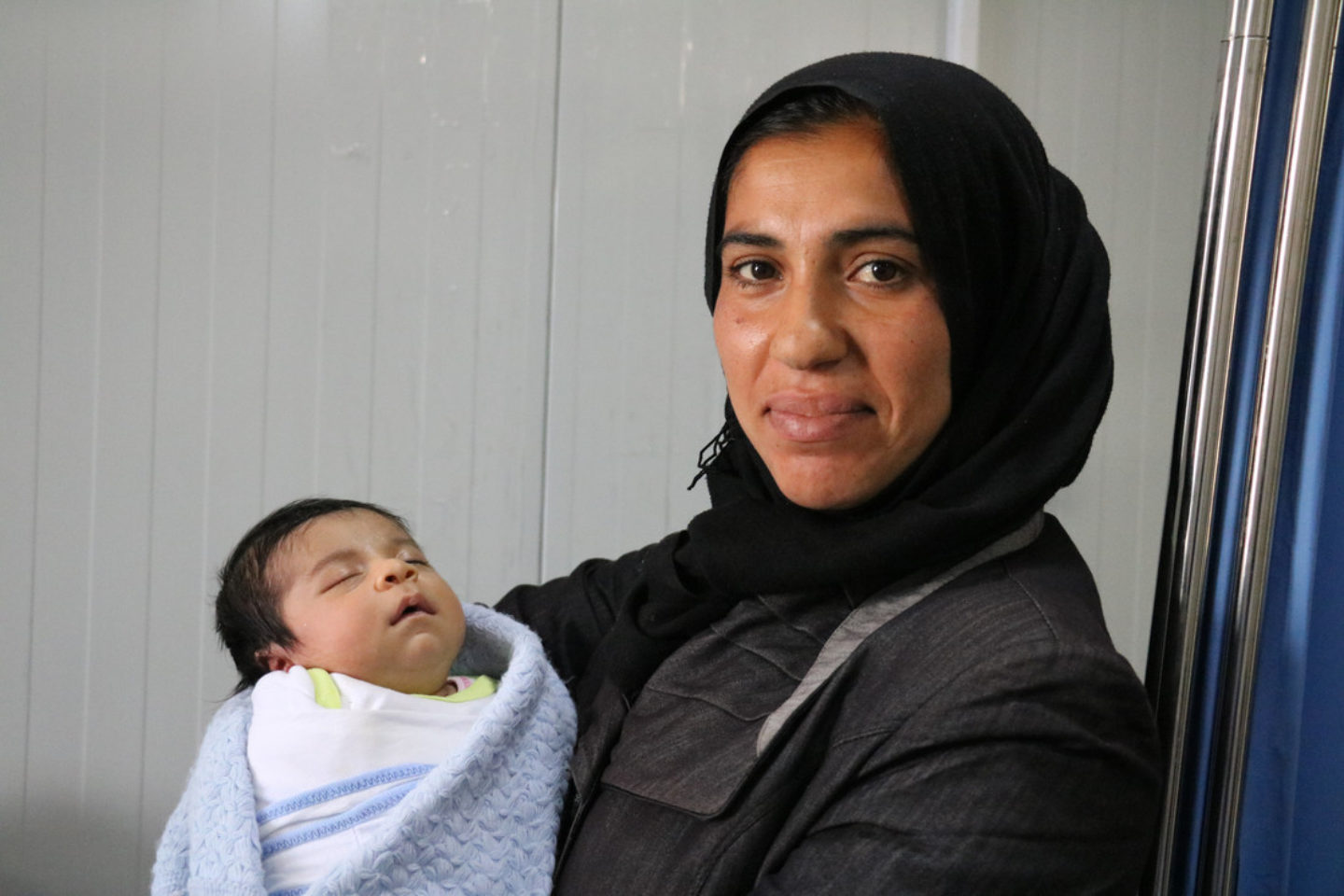Fazia visits the Medair clinic with her son Hassan.