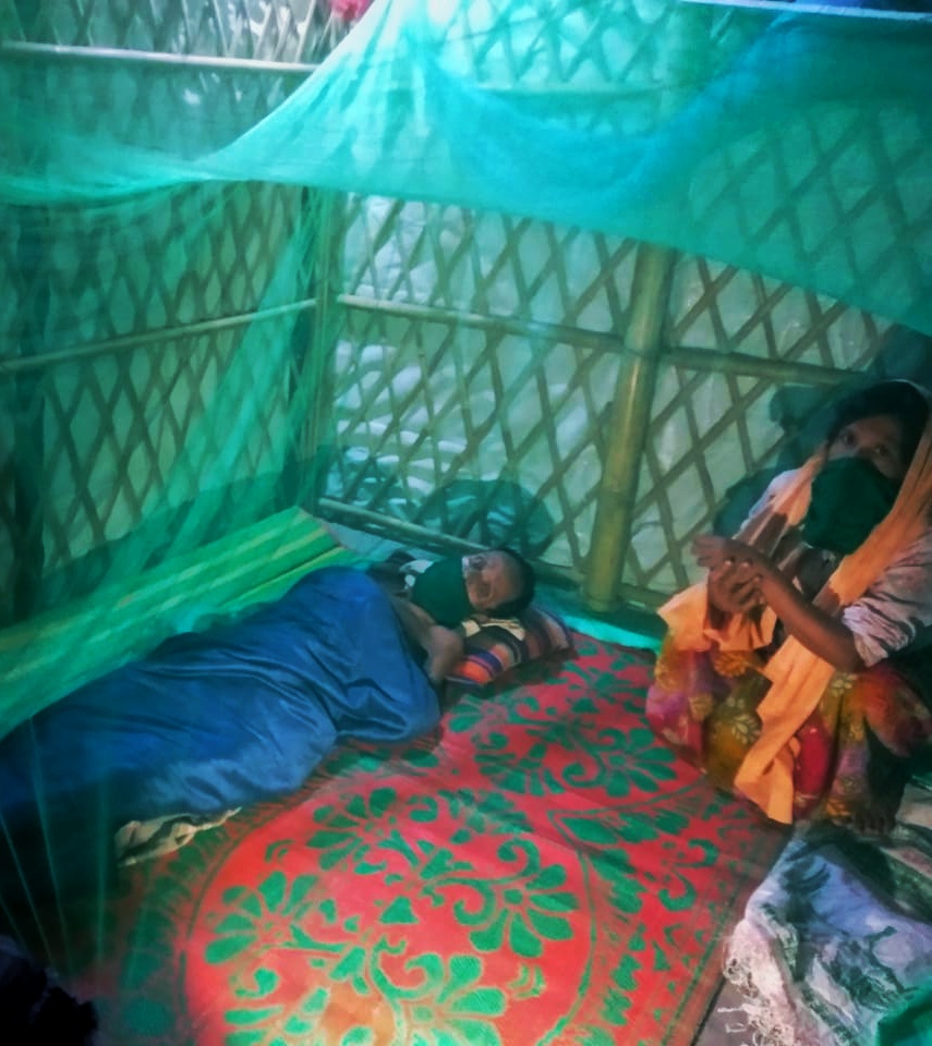 Asif and Amina, pictured in their shelter. © Medair