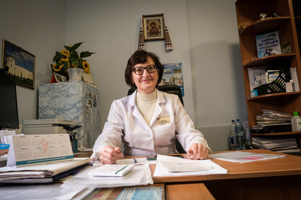 Svitlana, 57-year-old head doctor of the Primary Health Care Center (PHCC) sitting in her office