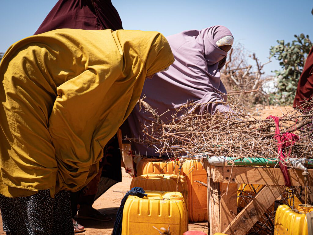 Women fetching drinking water in an IDP settlement in Southern Somalia.