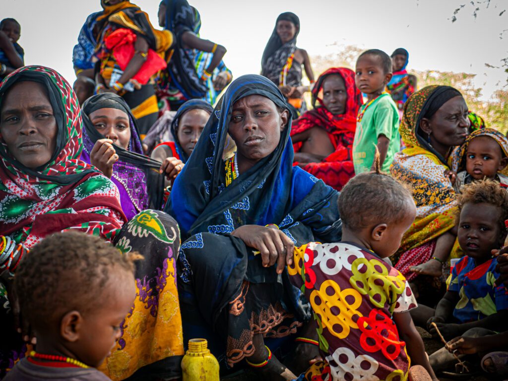 women sitting on the ground in Northern Kenya