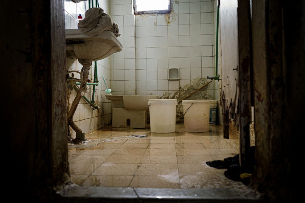 A bathroom in poor condition.